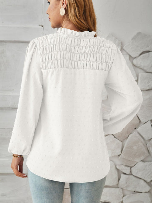 Blusa de manga globo con fruncido y lunares suizos